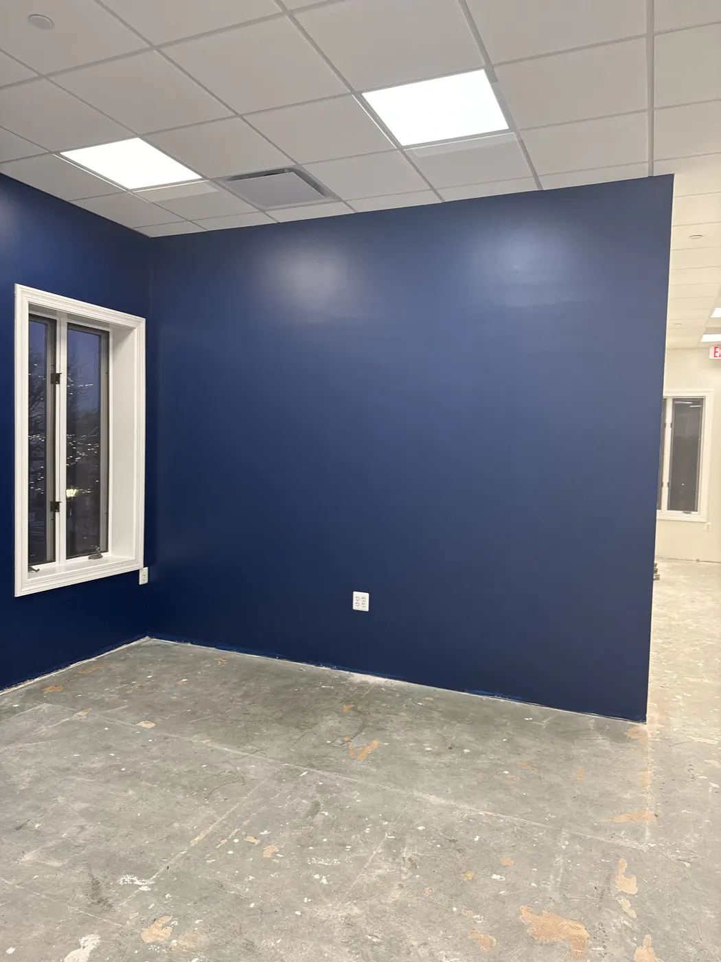 Freshly painted commercial interior wall and trim