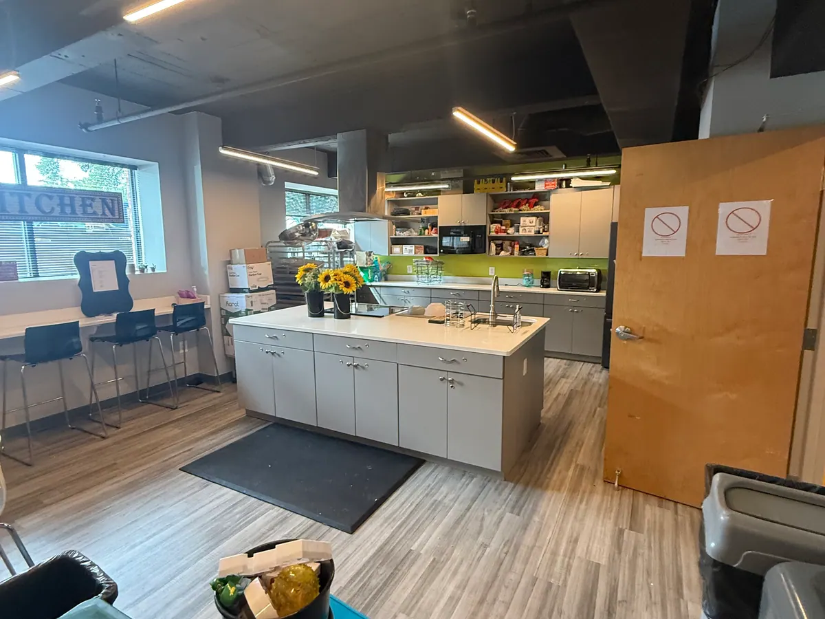 Commercial interior work area with finished surfaces and active project materials