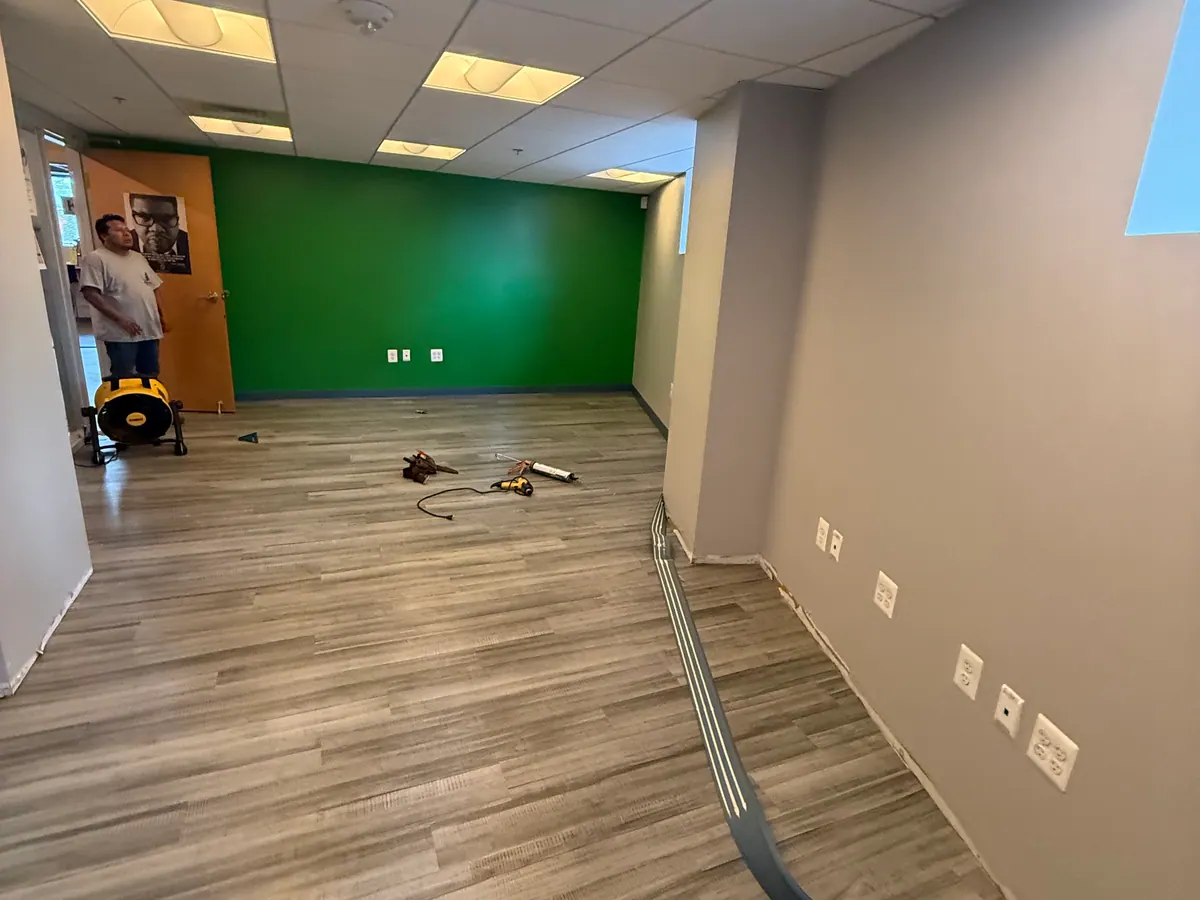 Commercial office interior with workstations and finished flooring