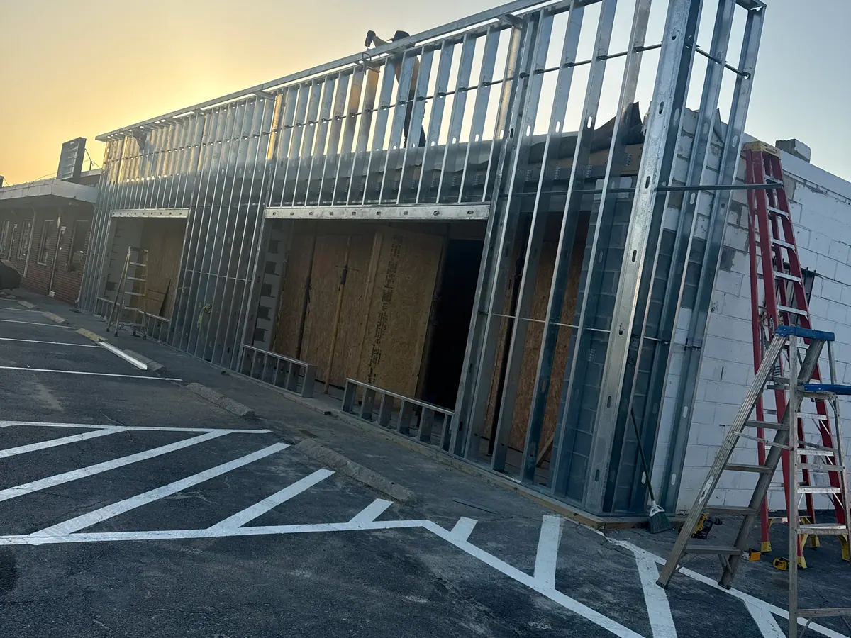 Commercial metal framing work area during active construction