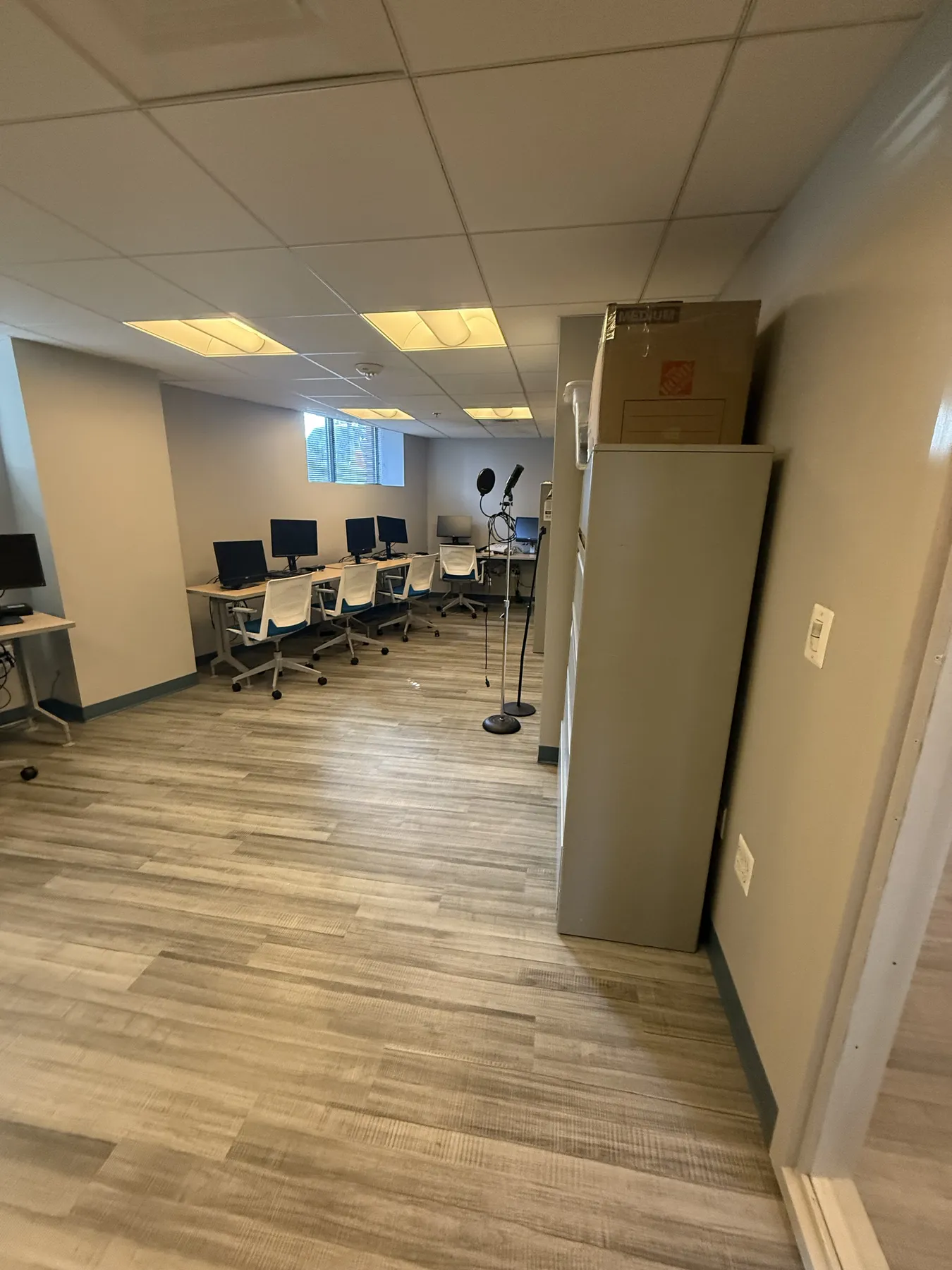 Commercial activity area with workstations and finished flooring