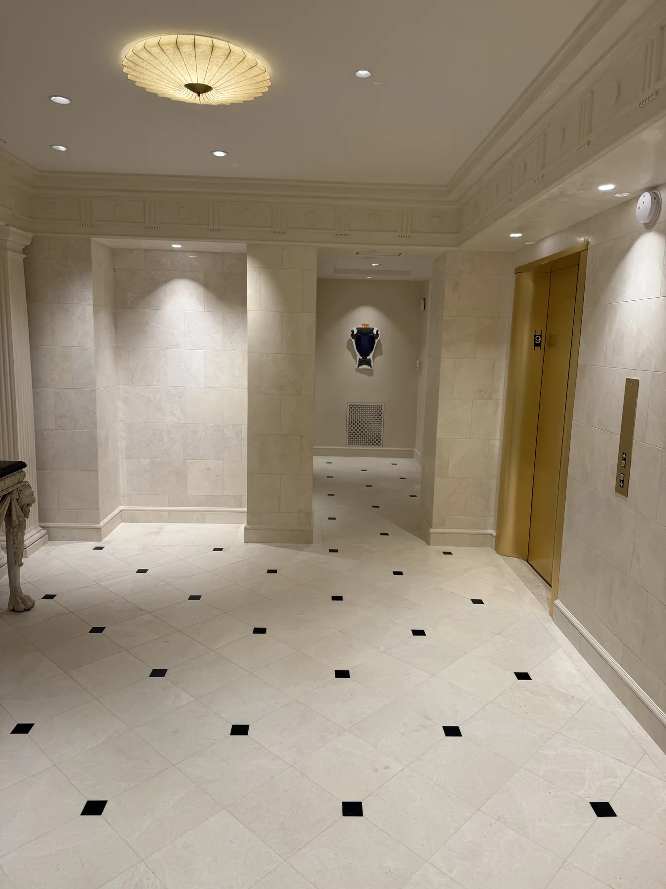 Finished interior lobby with detailed wall and floor finishes