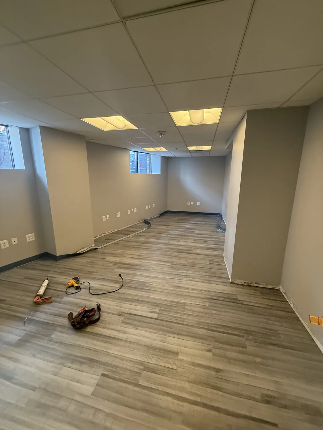 Commercial interior renovation area with tools organized for controlled work
